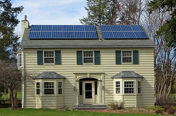 Handsome solar array on Classic colonial house outside the snowiest city in North America